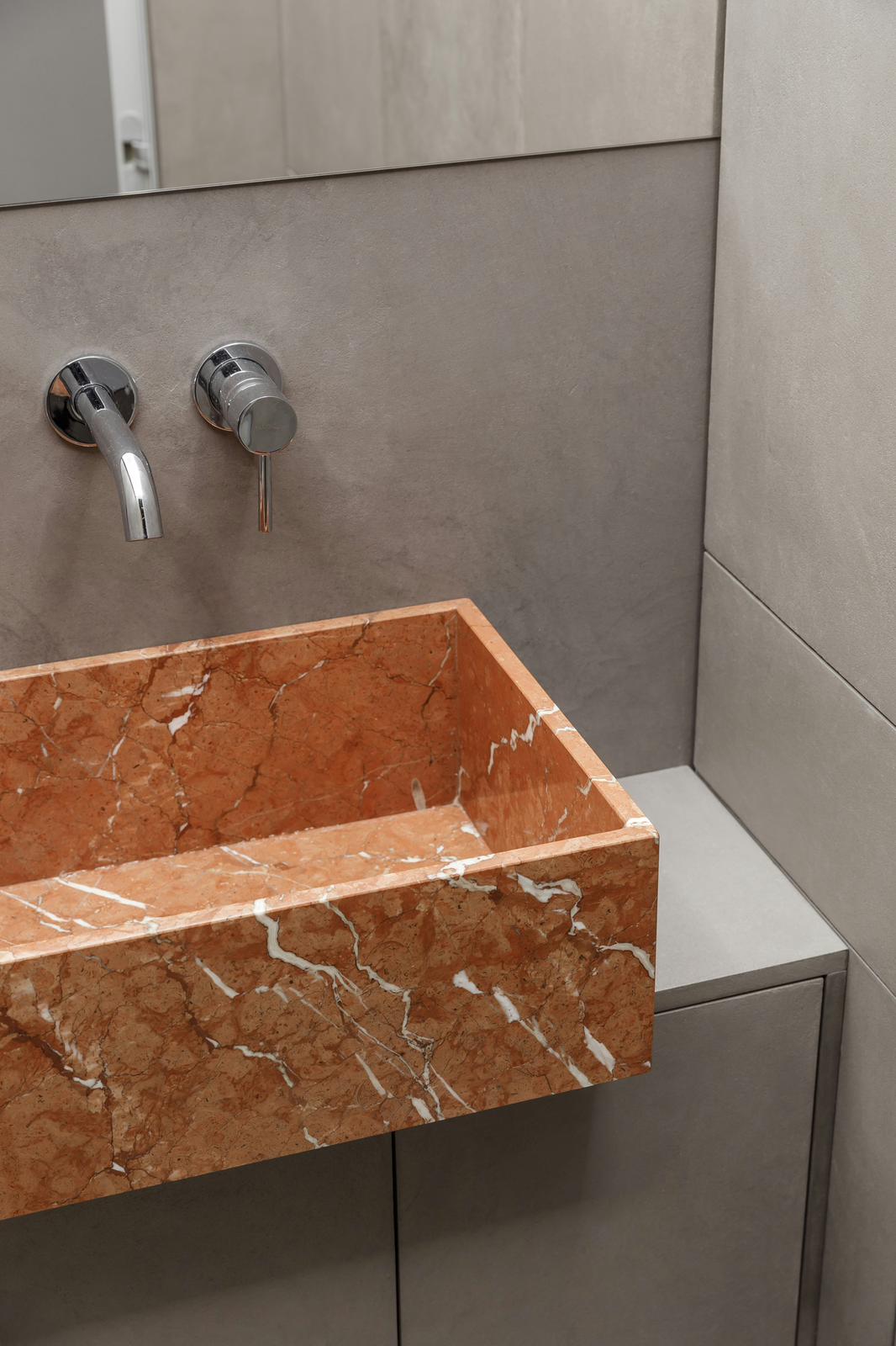 Luxury bathroom with terracotta marble sink