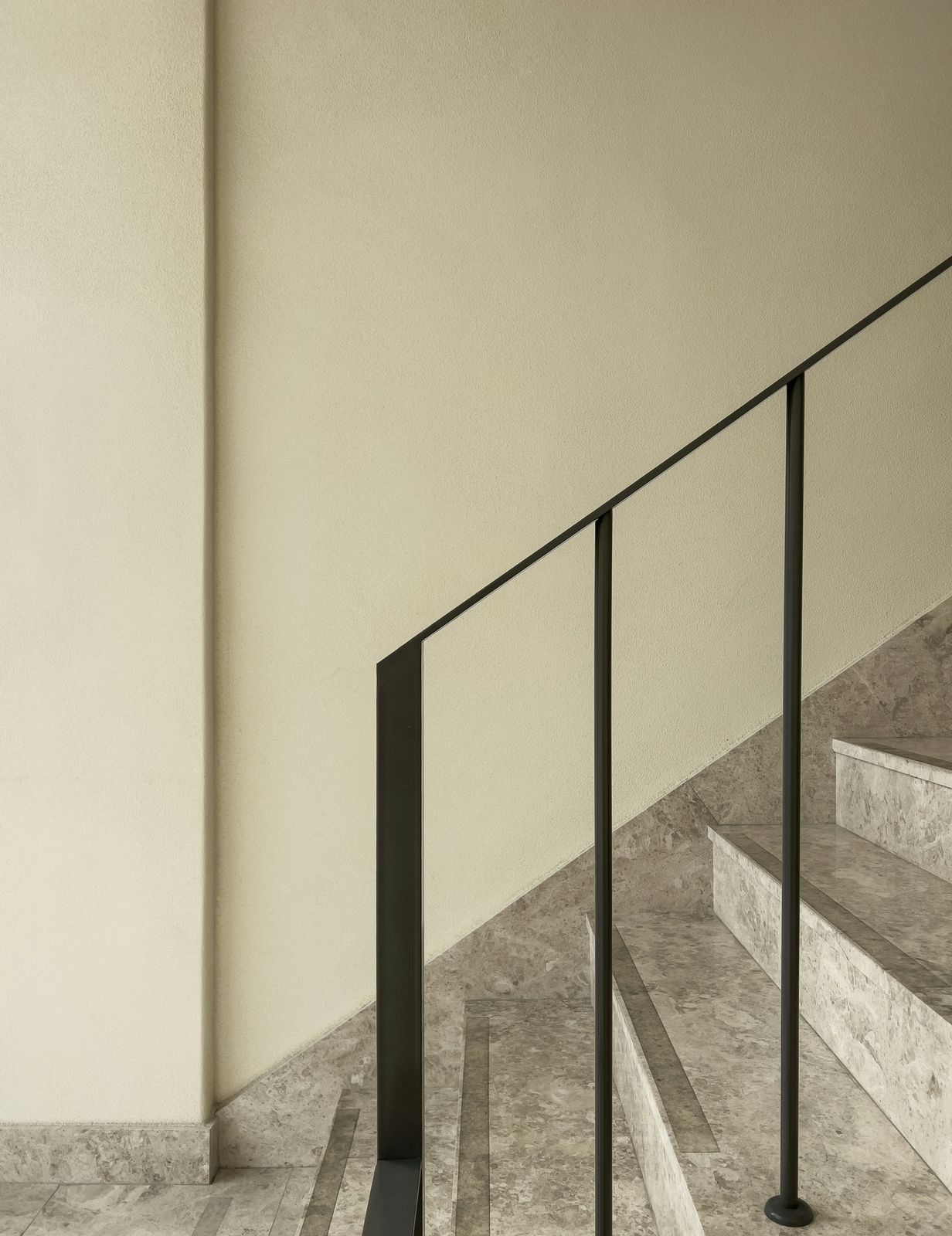Minimalist staircase with marble steps